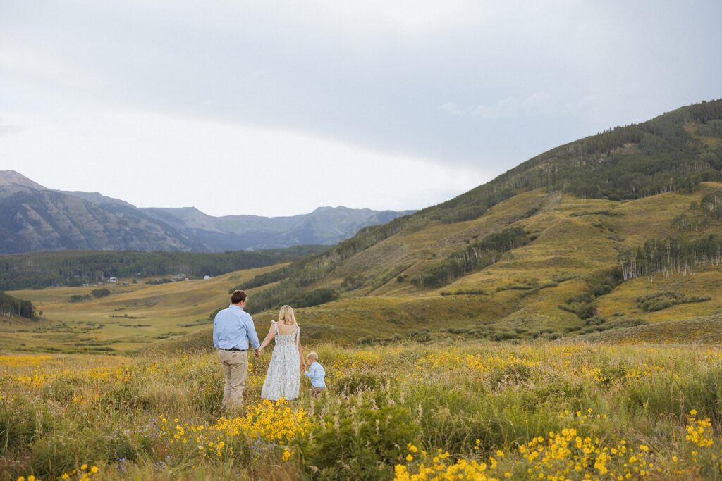 summer mountain family session in Mt Crested Butte with wildflowers in bloom