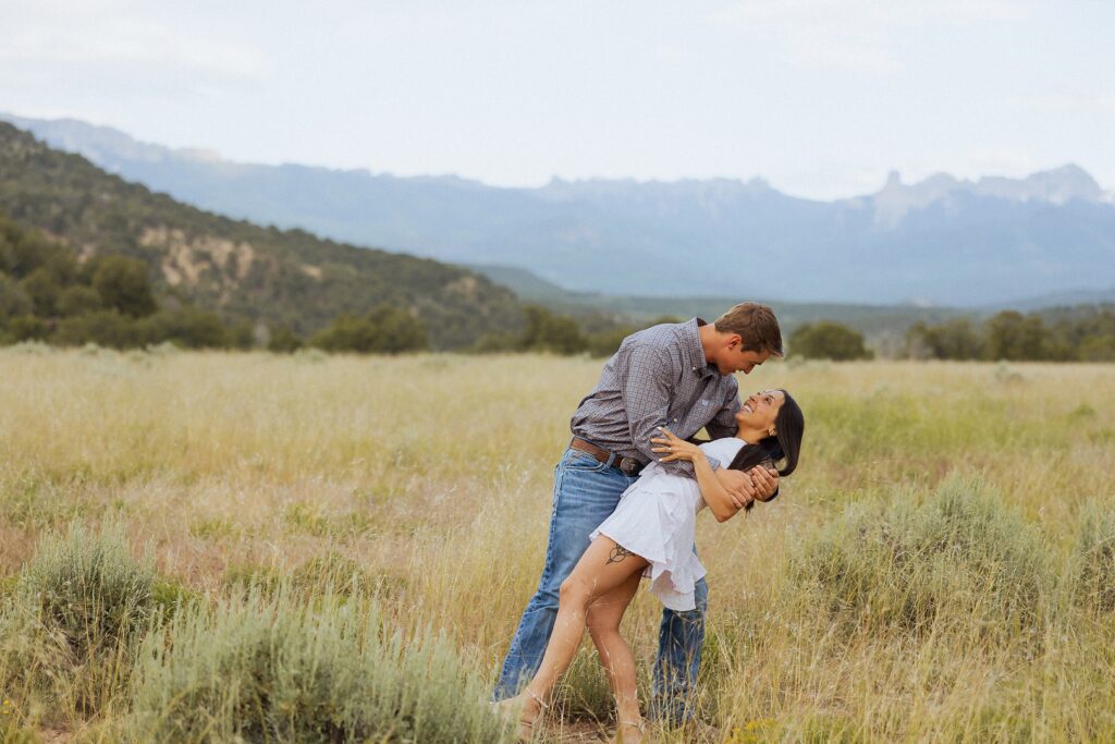 San Juan Mountain engagement photos with couple at sunset

Colorado mountain engagement session with glowing alpenglow

couple standing in San Juan Mountains during engagement session

engagement photos in San Juan Mountains with mountain backdrop