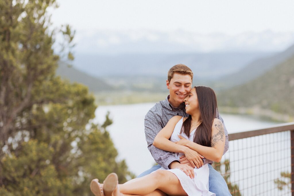 romantic engagement photos in the San Juan Mountains

couple embracing during Colorado mountain engagement session

bride and groom portraits in San Juan Mountain engagement photos

couple laughing together in San Juan Mountains engagement session