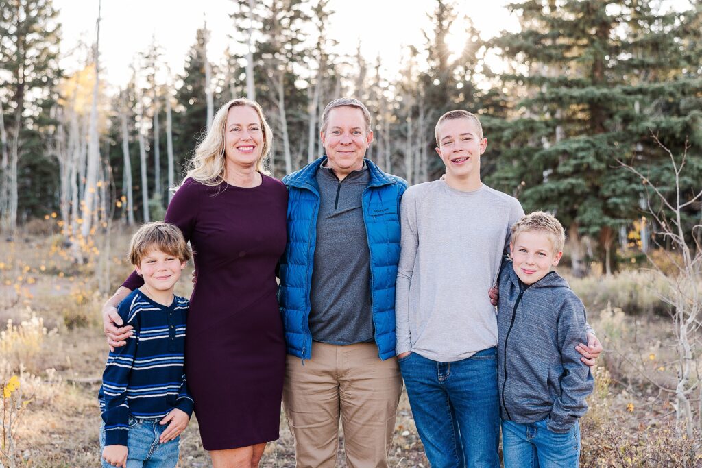 golden aspen family photos
brothers laughing in fall trees
davewood road family session
golden aspens in western colorado
family portraits with fall colors