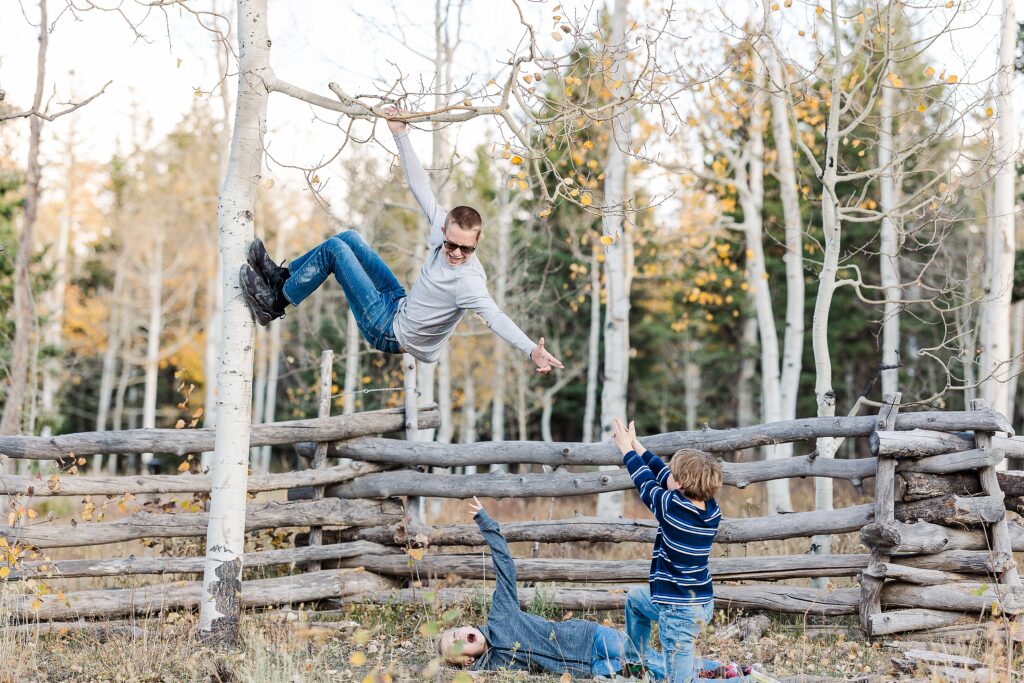 golden aspen family photos
brothers laughing in fall trees
davewood road family session
golden aspens in western colorado
family portraits with fall colors