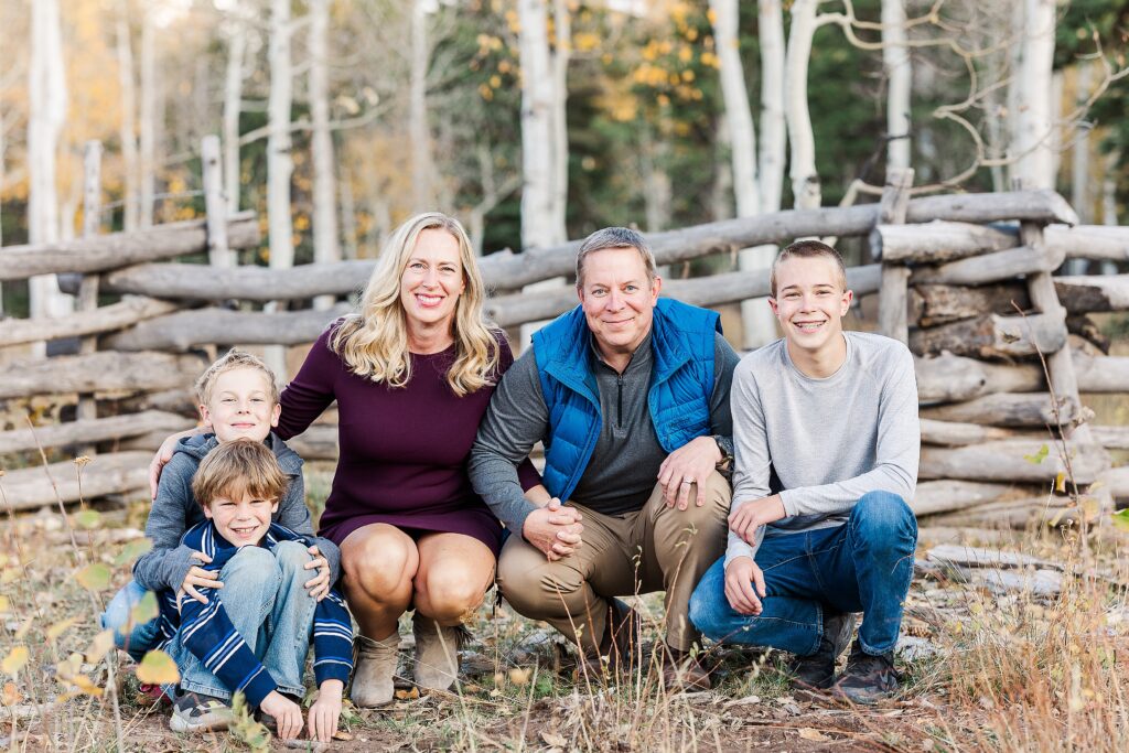 golden aspen family photos
brothers laughing in fall trees
davewood road family session
golden aspens in western colorado
family portraits with fall colors