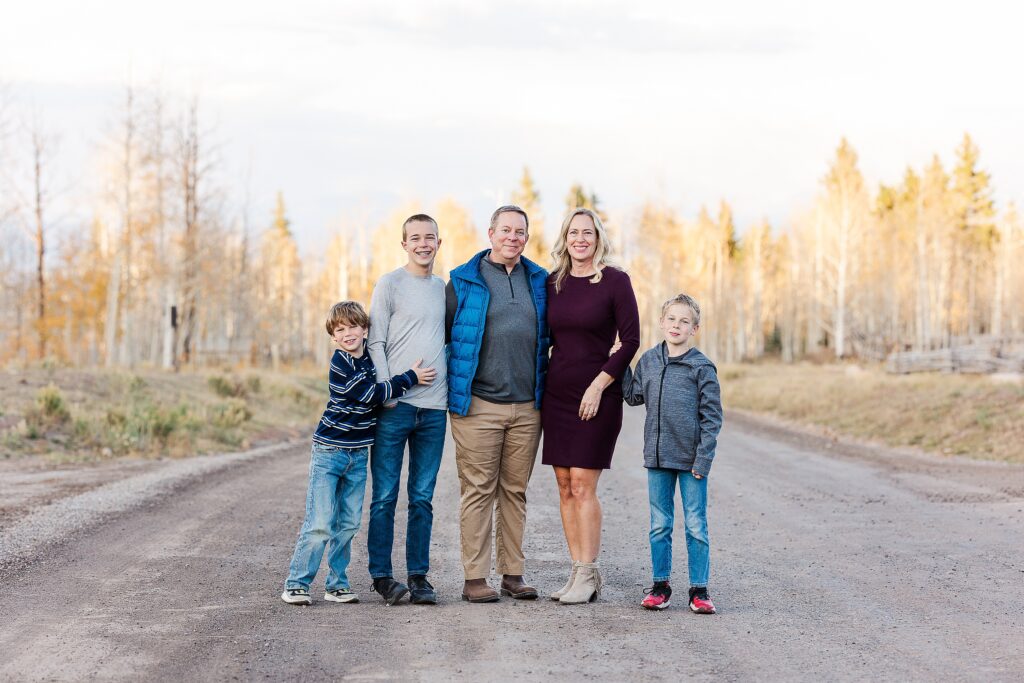 golden aspen family photos
brothers laughing in fall trees
davewood road family session
golden aspens in western colorado
family portraits with fall colors