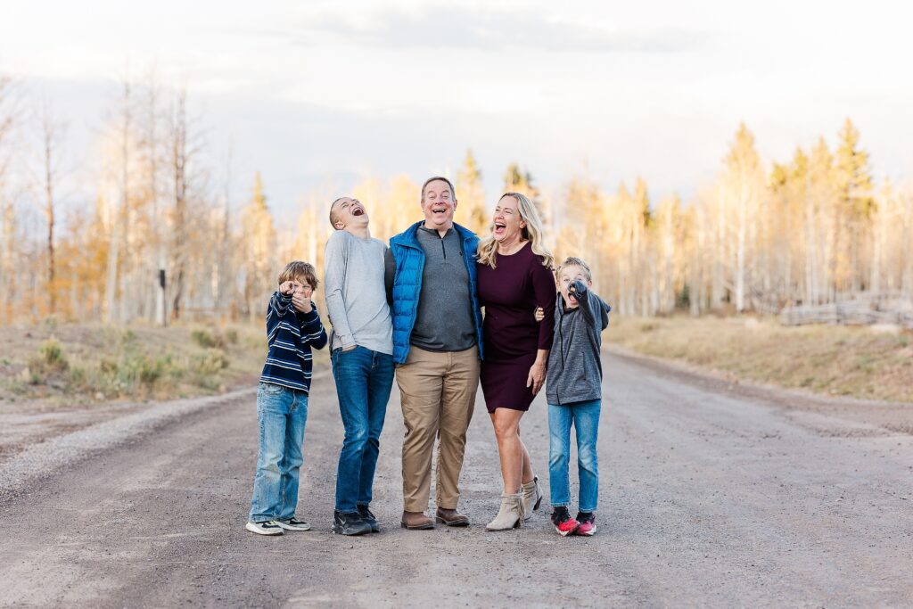 golden aspen family photos
brothers laughing in fall trees
davewood road family session
golden aspens in western colorado
family portraits with fall colors