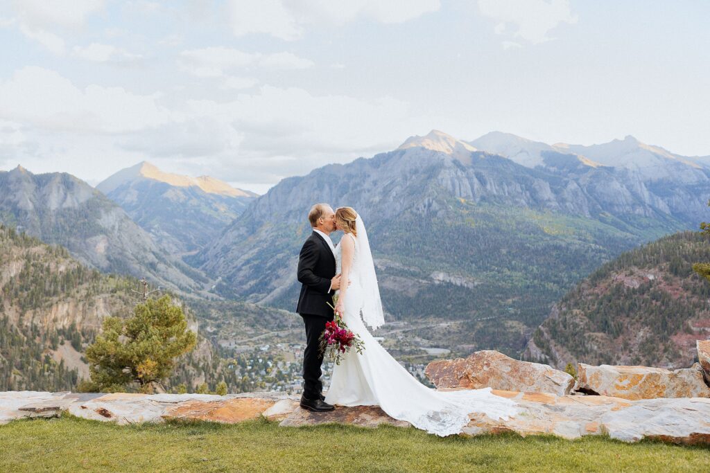 Ouray Colorado wedding photos with couple overlooking mountains
