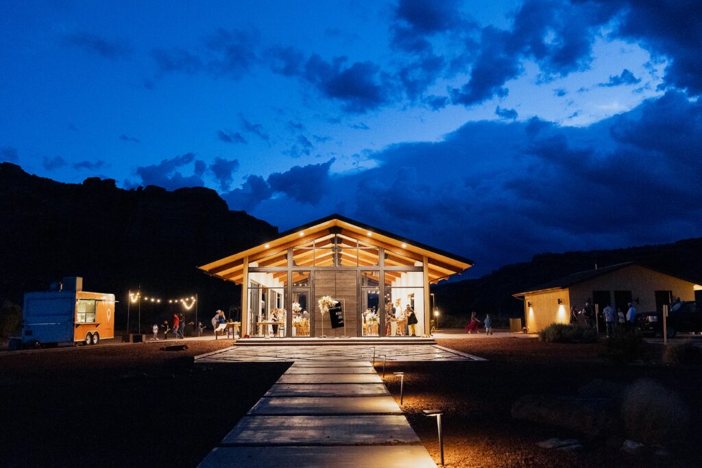 Moab Utah wedding with red rock cliffs and desert views at night
