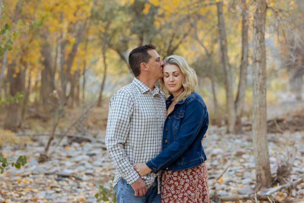 couple gathered together during sunset session in Fruita Colorado