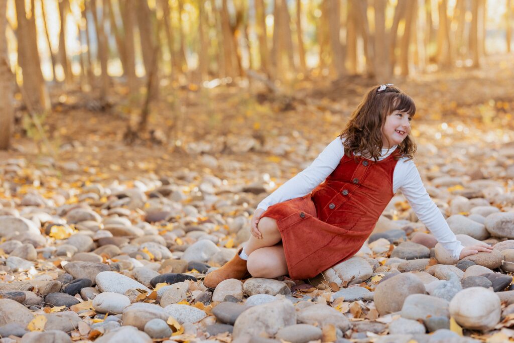 Child smiling during family session in Fruita Colorado
